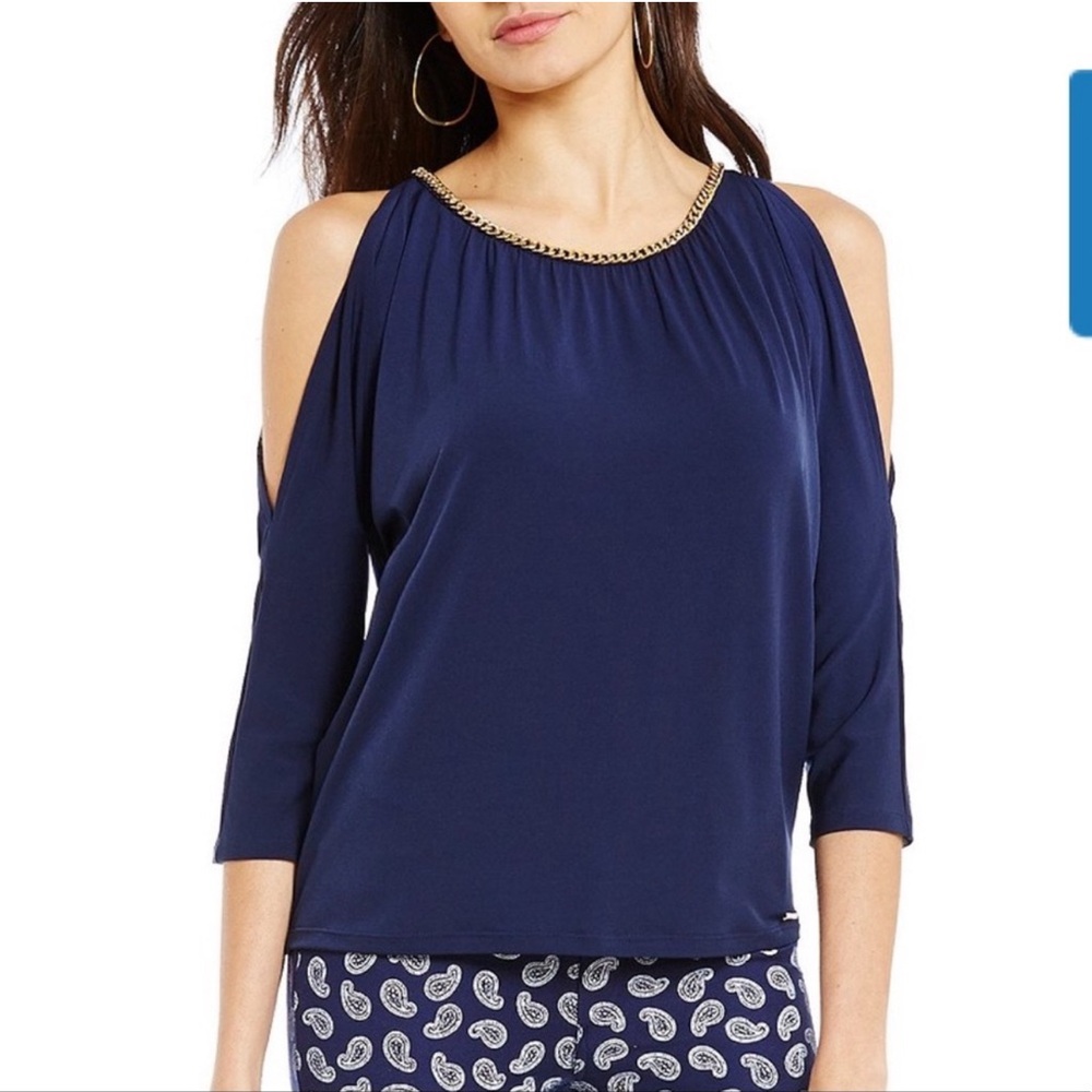 Blue royal color, open shoulder with gold stud on neck brand new with out tags .